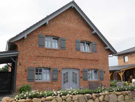 Dieses moderne Landhaus bauen wir mit über 170 m² Grundriss und 2 Kinderzimmer - schlüsselfertig gebaut im Raum Hamburg, Kiel, Neumünster, Norderstedt